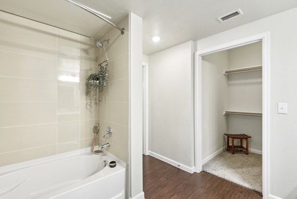 Luxurious bathroom with modern fixtures at Agora Stone Oak Apartments