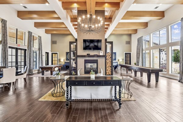 Chic clubhouse with modern decor at Agora Stone Oak Apartments, ideal space for gatherings and events in a luxury setting