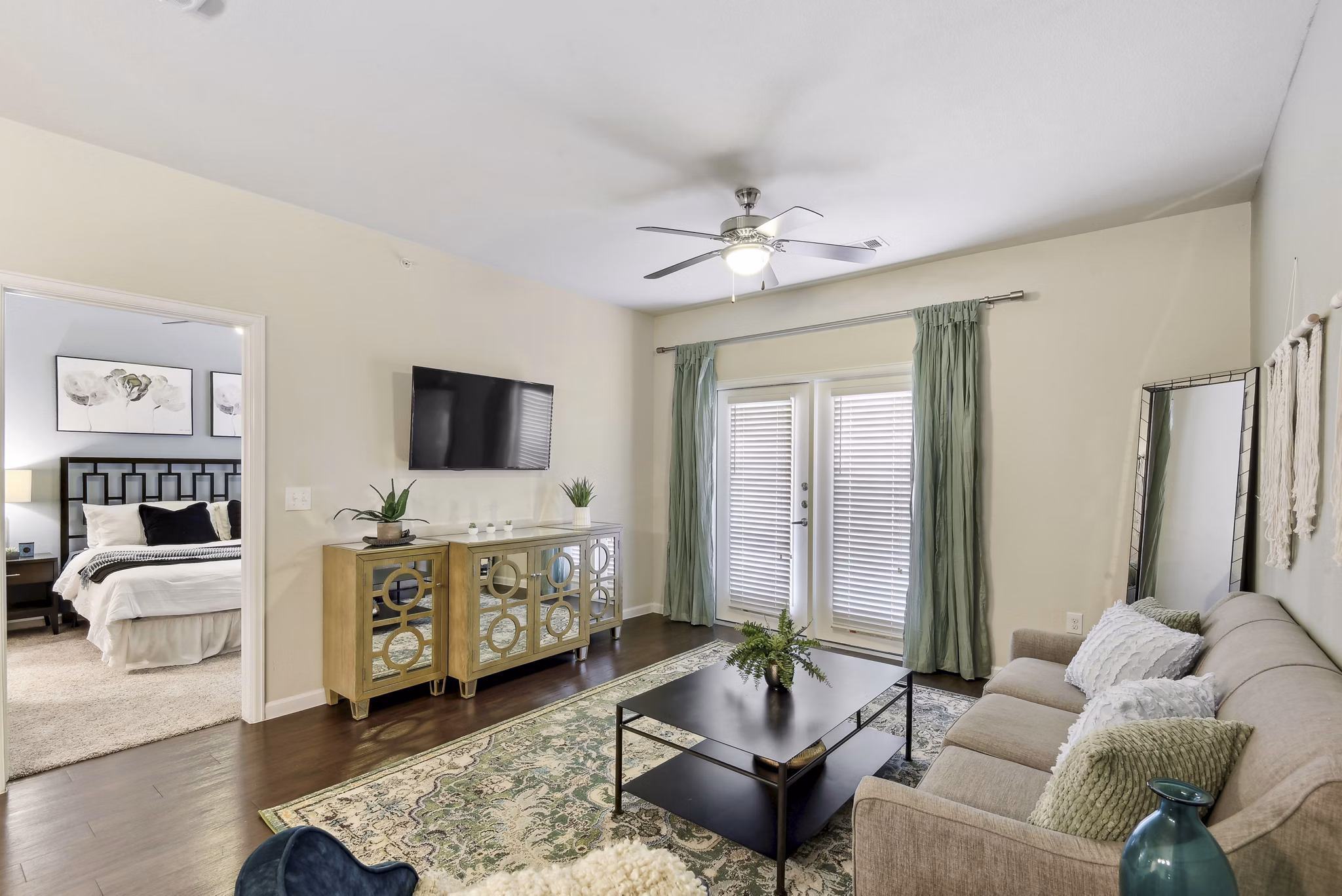 Spacious living room with modern decor in Agora Stone Oak Apartments