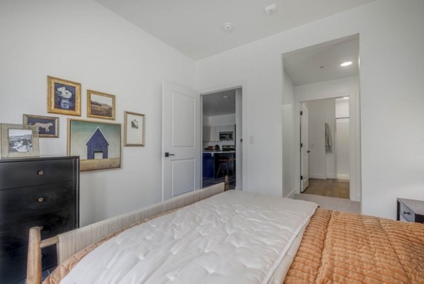 Organized bedroom closet with ample shelving at The Opal Apartments, luxury living spaces