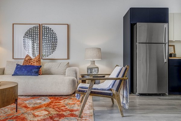 Spacious living room featuring modern decor at The Opal Apartments, a luxury Greystar property