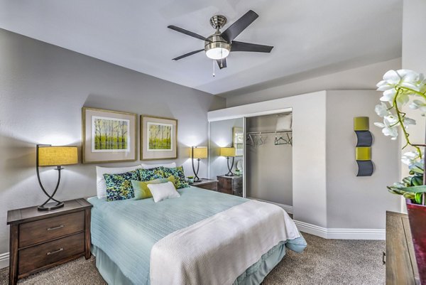Cozy bedroom with modern decor at Parkway Townhomes