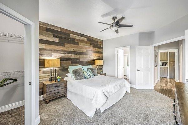 Bedroom featuring modern design and ample natural light in Parkway Townhomes