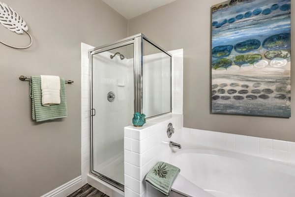 Modern bathroom with sleek fixtures at Parkway Townhomes luxury apartments