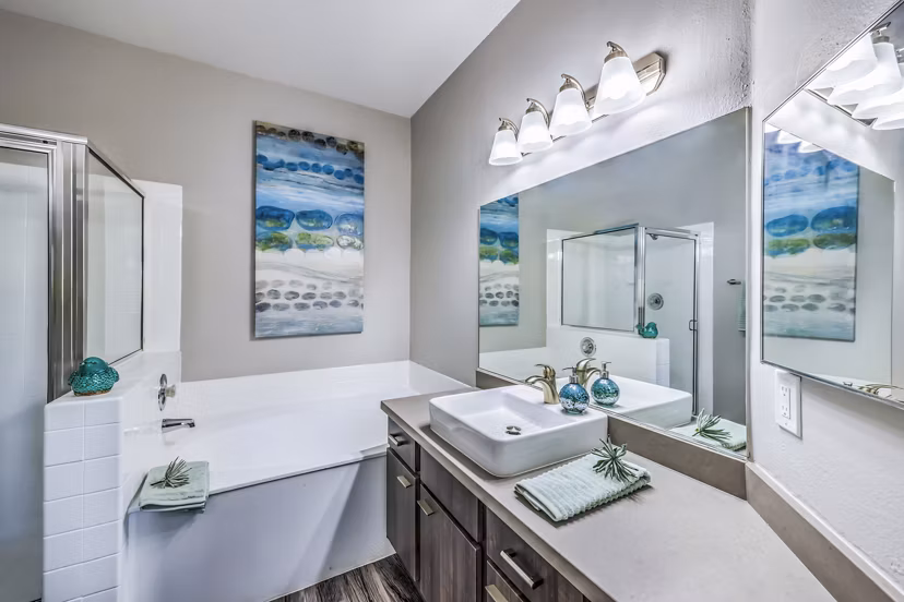 Bathroom with modern fixtures and marble countertops at Parkway Townhomes
