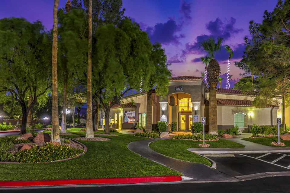 Clubhouse with cozy seating and modern fixtures at Parkway Townhomes Apartments