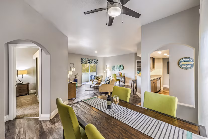 Dining room with elegant decor at Parkway Townhomes Apartments, featuring stylish furnishings and a cozy atmosphere