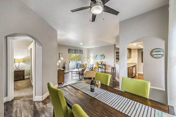 Dining room with elegant decor at Parkway Townhomes Apartments, featuring stylish furnishings and a cozy atmosphere