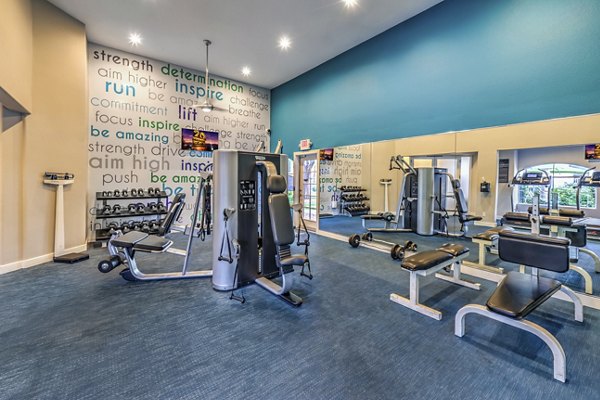 Fitness center with modern equipment at Parkway Townhomes, ideal for luxury apartment residents seeking wellness and exercise options