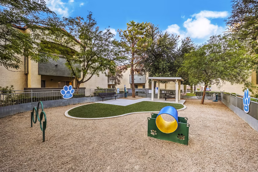 Off-leash dog park at Parkway Townhomes, offering pet-friendly spaces for residents to enjoy outdoor activities with their dogs