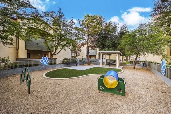Off-leash dog park at Parkway Townhomes, offering pet-friendly spaces for residents to enjoy outdoor activities with their dogs