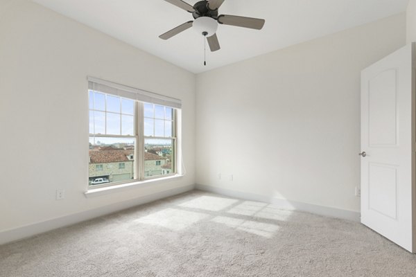 Luxurious bedroom with ocean views at Lighthouse Pointe Apartments