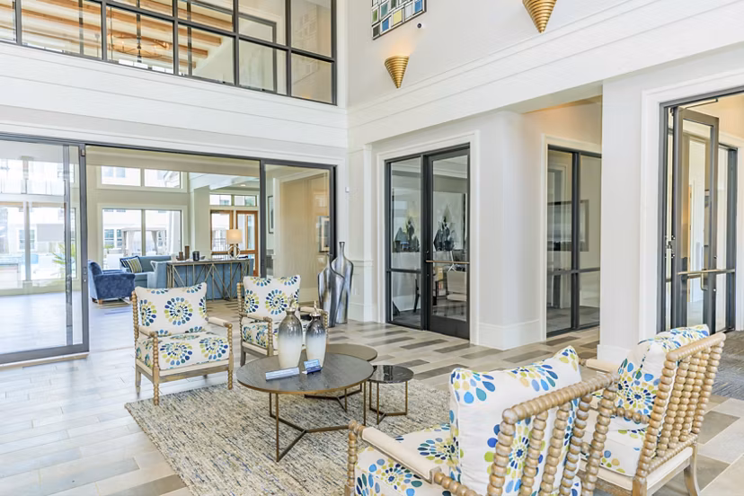 Lobby featuring modern furnishings and art in Wyldewood Gosling Apartments