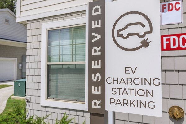 Eco-friendly car charging station at Wyldewood Gosling Apartments providing sustainable options for residents