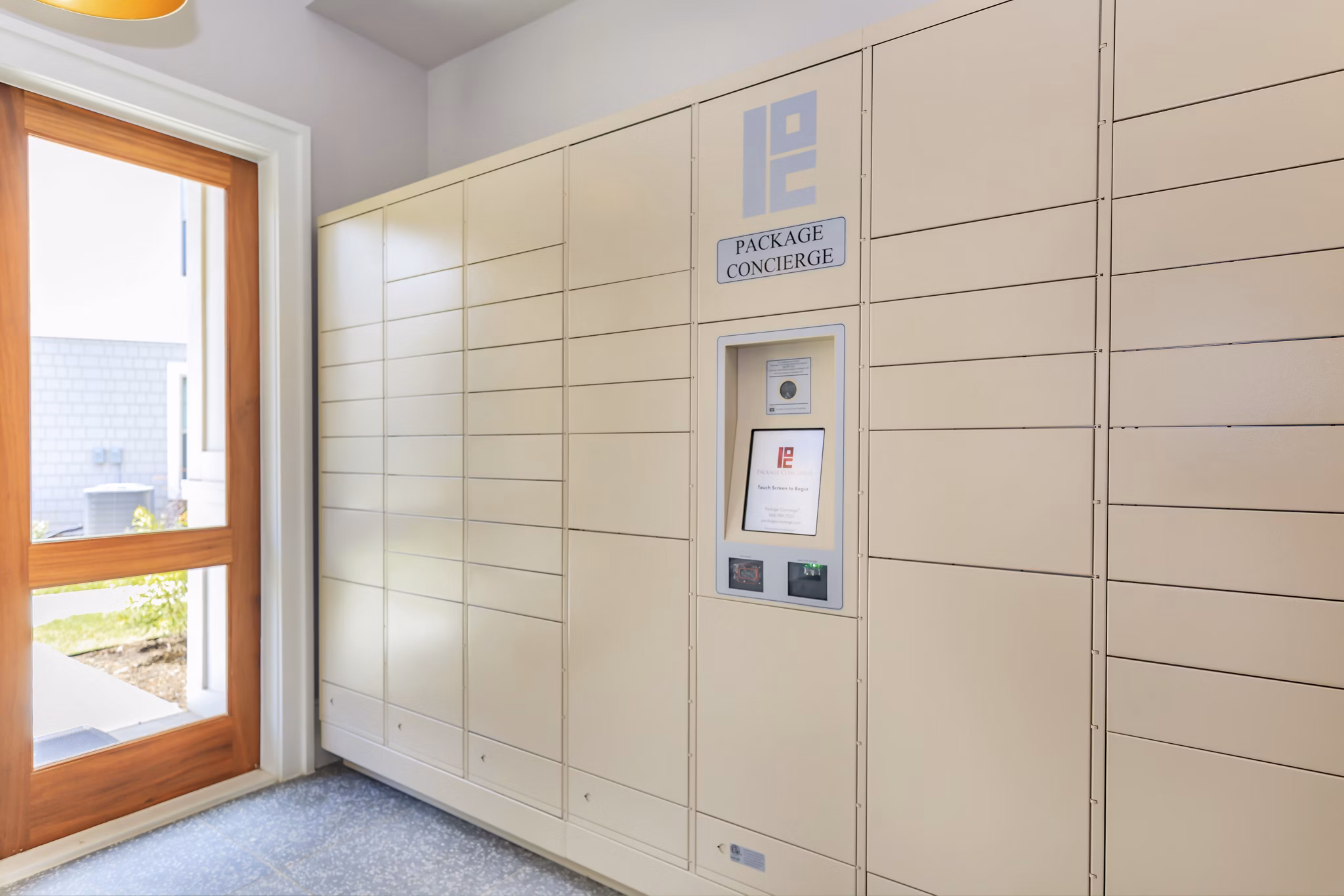 Mail room with secure package lockers at Wyldewood Gosling Apartments