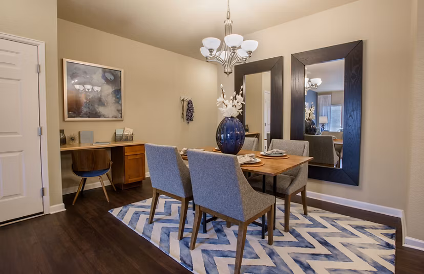 Modern dining area with elegant lighting at Whisper Sky Apartments luxury living in vibrant Denver