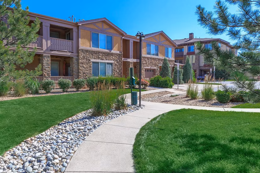 Courtyard with modern landscaping at Whisper Sky Apartments