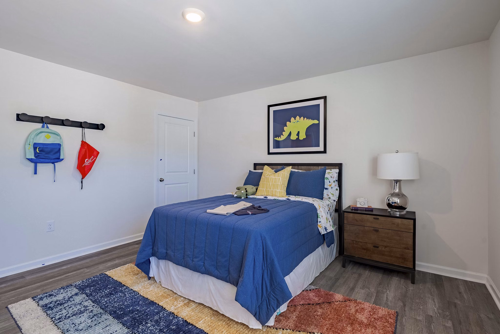 Elegant bedroom with natural light at Summerwell Harmony Apartments