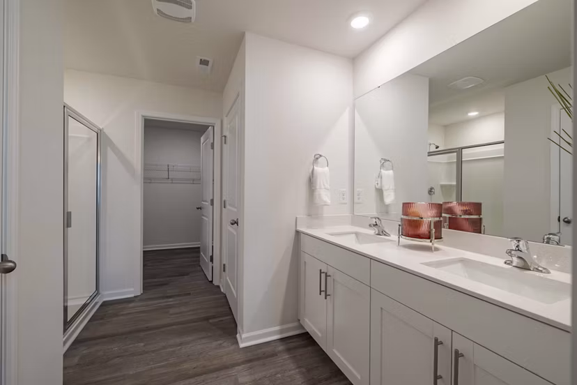 Modern bathroom with sleek fixtures at Summerwell Harmony Apartments