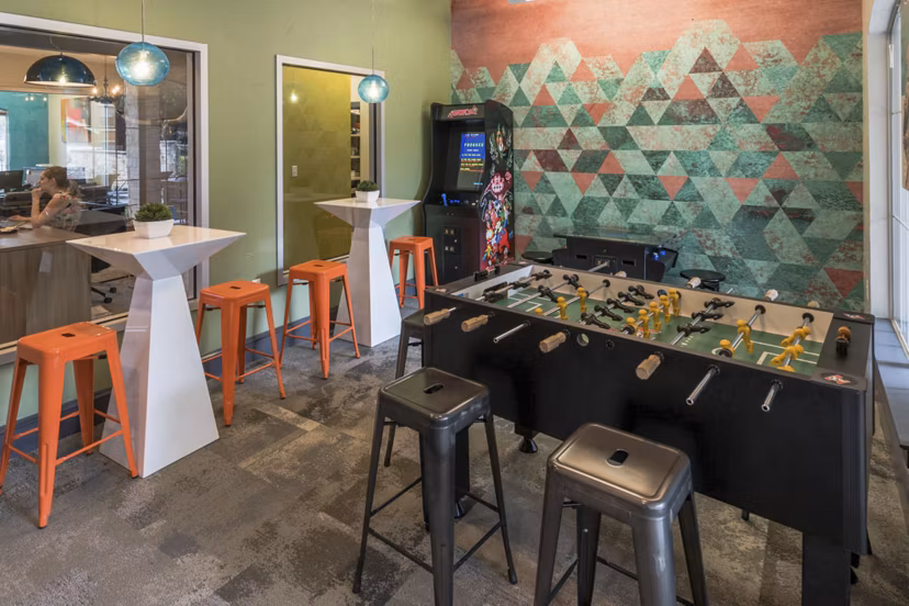 game room at District on La Frontera Apartments
