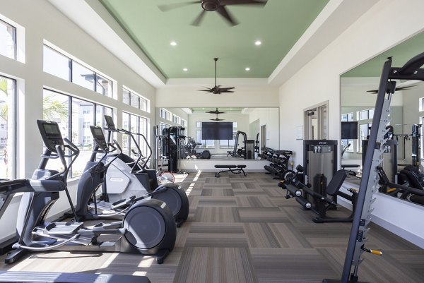 Fitness center with modern equipment at Prose Thunder Rock Apartments