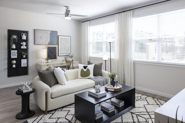 Spacious living room featuring modern decor at Prose Thunder Rock Apartments