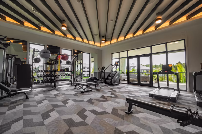 fitness center at Reva Apartments