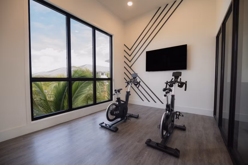 fitness center at Reva Apartments