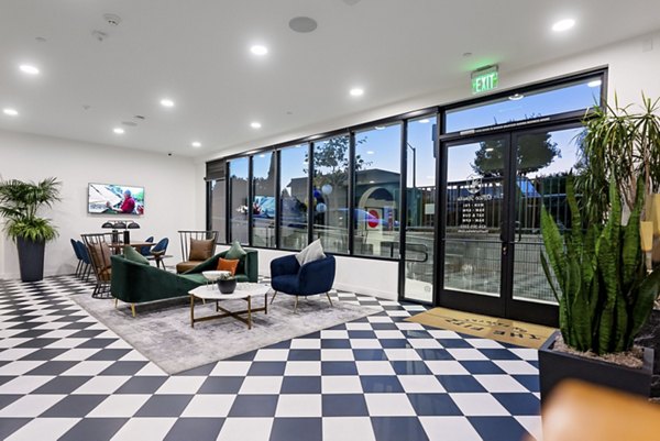 Stylish clubhouse with modern decor at Fitz on Fairfax Apartments
