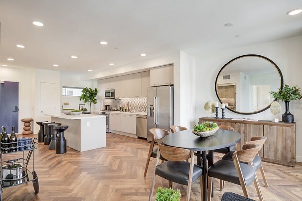 Dining area with chic decor at Fitz on Fairfax Apartments