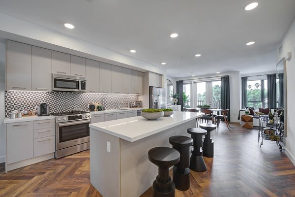 Stylish kitchen with modern appliances at Fitz on Fairfax Apartments