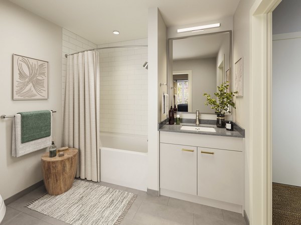 Bathroom featuring modern fixtures at Maxwell Apartments