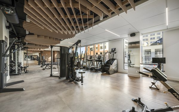 Modern fitness center with state-of-the-art equipment at Maxwell Apartments