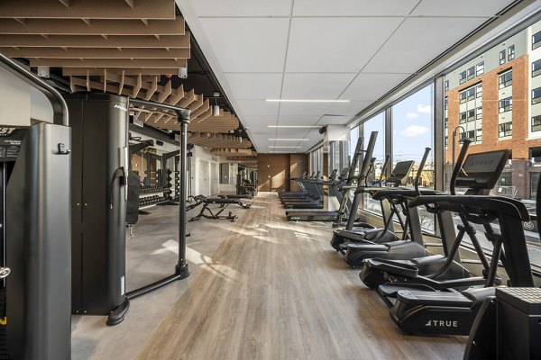 Modern fitness center with state-of-the-art equipment at Maxwell Apartments