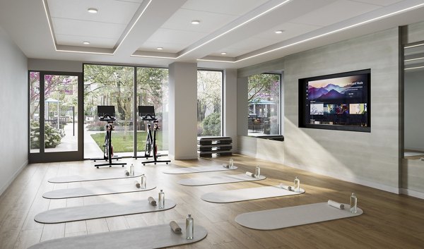 Fitness center featuring state-of-the-art equipment and modern design at Maxwell Apartments