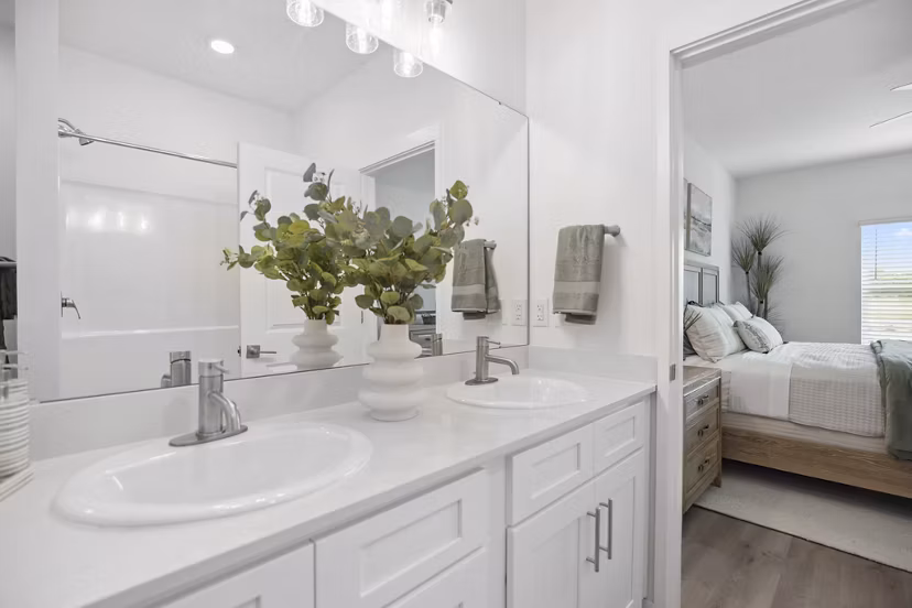 Bright bathroom with modern fixtures at River Rock at Dallas Apartments