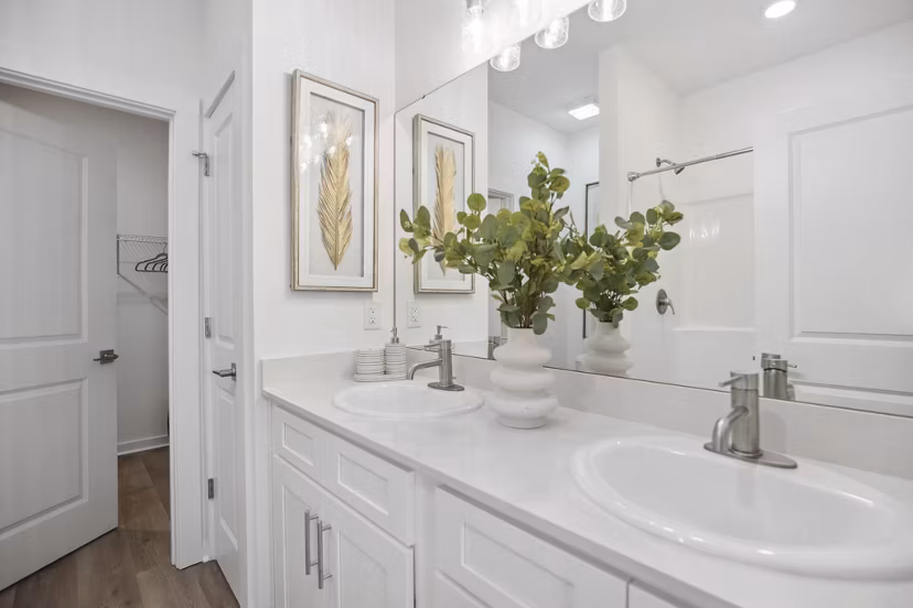 Bathroom featuring sleek vanity and modern fixtures in River Rock at Dallas Apartments