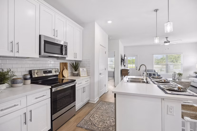 Spacious kitchen with modern appliances in River Rock at Dallas Apartments