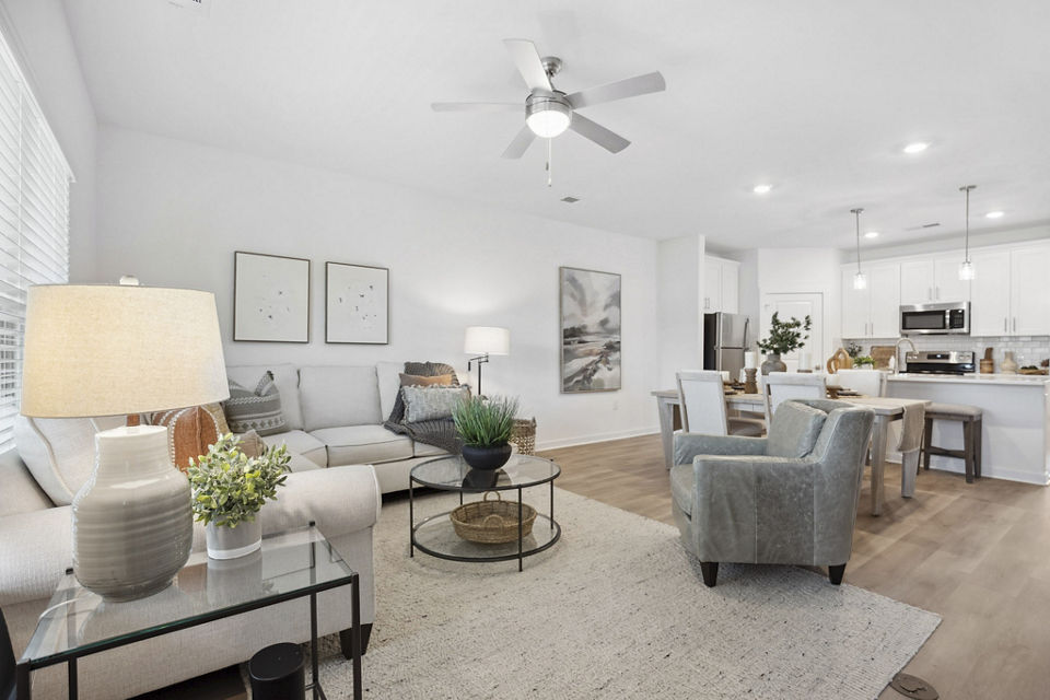 Spacious living room with modern decor at River Rock Apartments in Dallas
