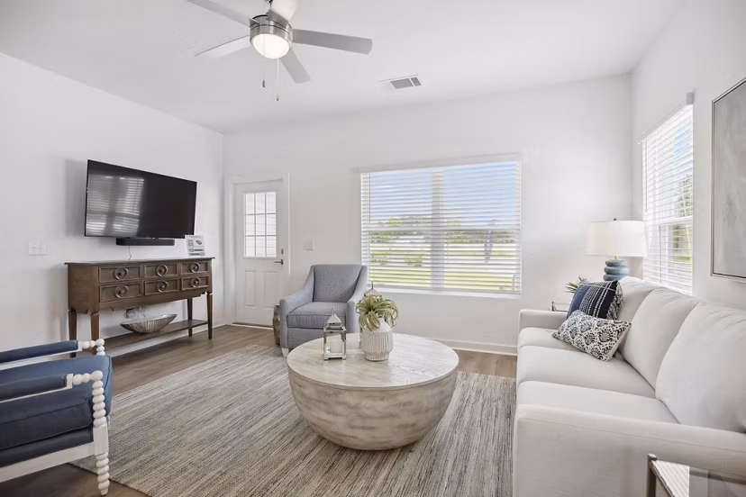 Spacious living room with modern decor in River Rock at Dallas Apartments