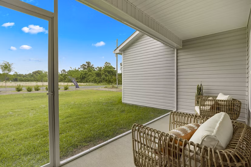 Cozy patio with modern furniture at River Rock Apartments in Dallas, perfect for relaxing and entertaining outdoors