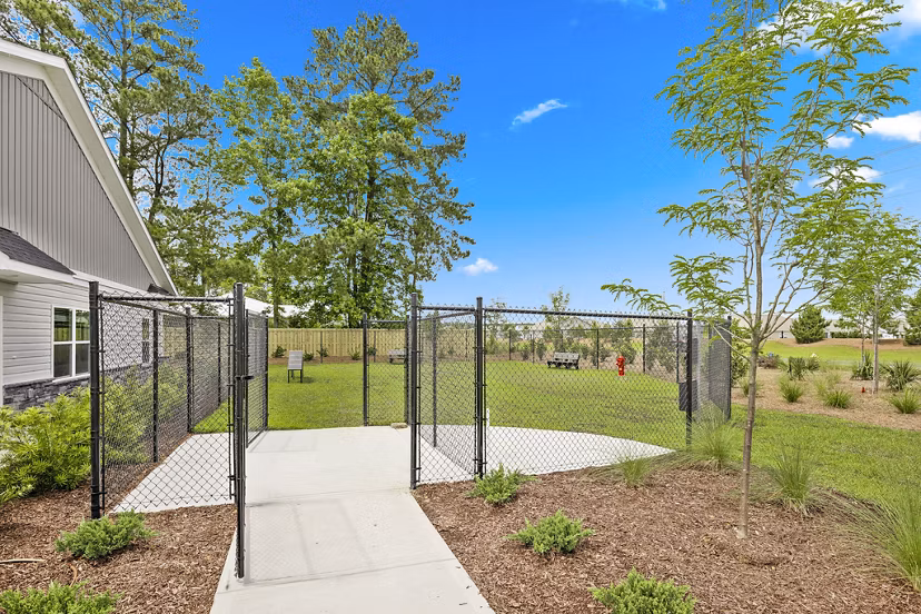 Dog-friendly park with agility equipment at River Rock at Dallas Apartments