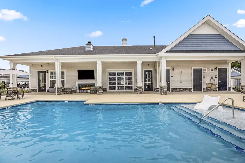 Sparkling outdoor pool at River Rock at Shingletree Apartments