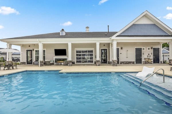 Sparkling outdoor pool at River Rock at Shingletree Apartments