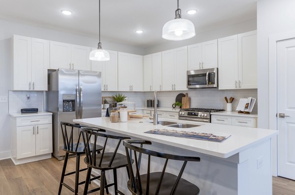kitchen at River Rock at Alexander Farms (The Village) Apartment Townhomes