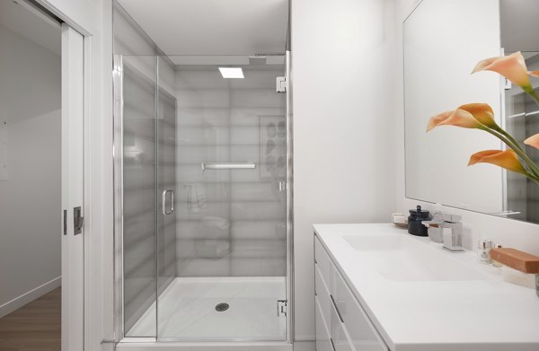 Bathroom featuring modern fixtures and elegant design at The Sudbury Apartments