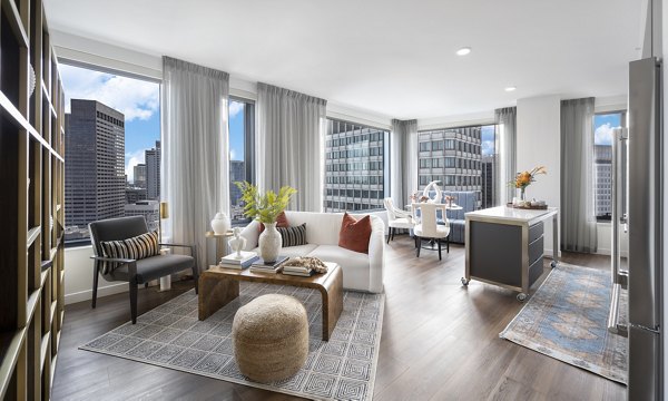 Spacious living room with modern decor at The Sudbury Apartments, offering luxury living in a prime location Perfect for relaxation and entertaining guests