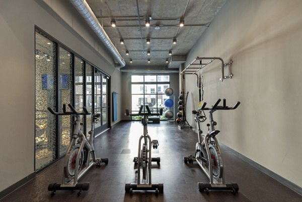 fitness center at The Monroe Apartments