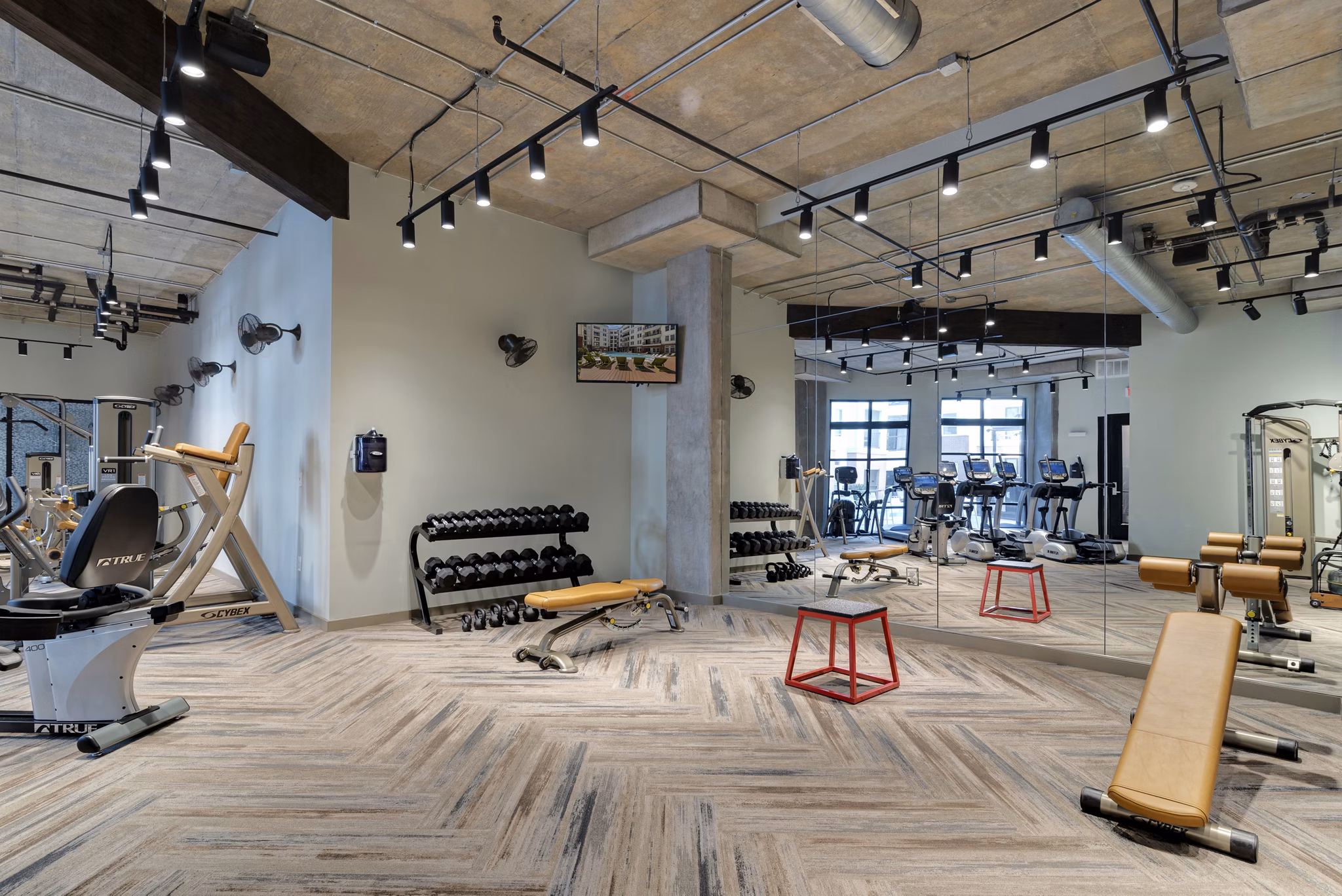 fitness center at The Monroe Apartments
