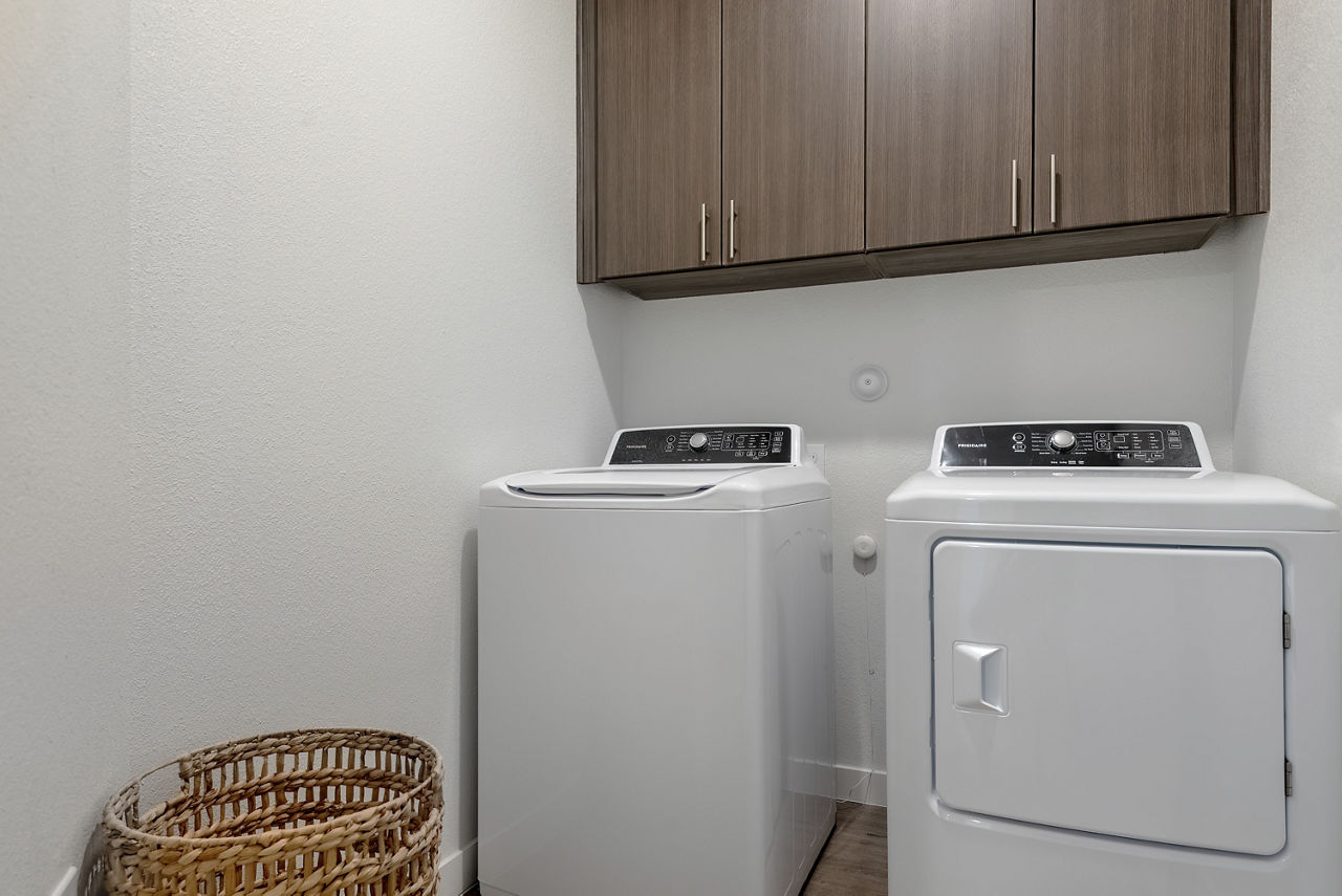 Laundry room at Arista Mckinney